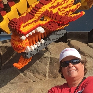 Susan Ann Walker with Lego dragon head